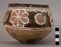 Earthenware bowl with cord-impressed and polychrome designs on exterior, broken and mended