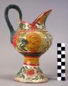 Ceramic pitcher with polychrome designs