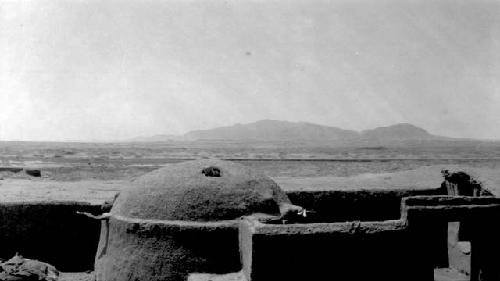 Building with dome with mountain in distance