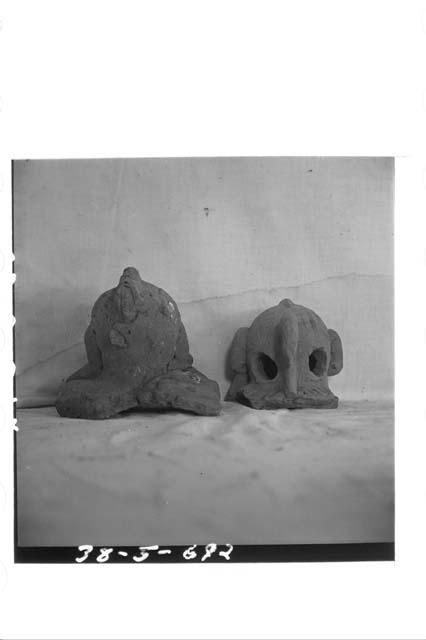 Two pottery heads