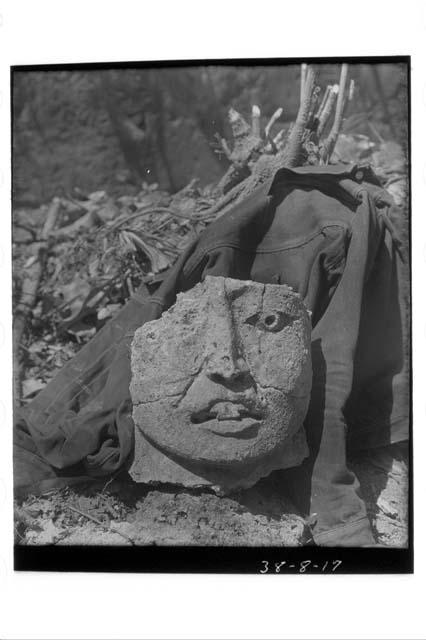 Stucco head, front view