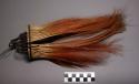 Feather headdress, upright brown and pink feathers on woven fiber and hair band