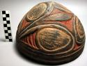 Pottery bowl - carved and colored designs