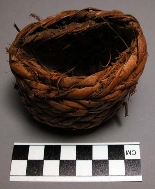 Woven fiber band, probably adze haft