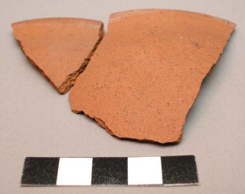 Sherds, ceramic, rim, redware, white accretion at rim, mend together