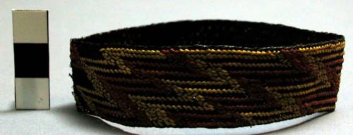 Woven fibre armband - zigzag design of red and yellow on black