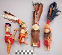Small wooden figures, shields and spears