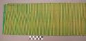 Green, yellow and white striped textile