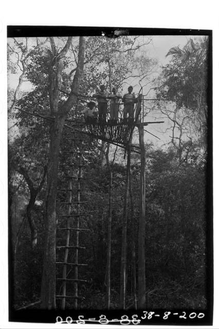 Scaffold - Built by Natives in front of building 4