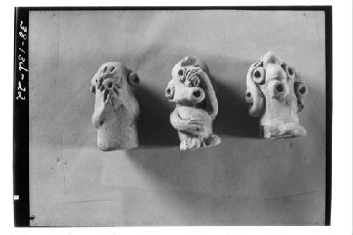 Three effigy candeleros. Field nos., left to right, 26-38, 28-38, 27-38.