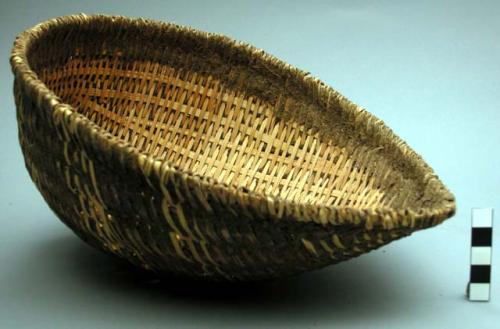 Wickerwork scoop-shaped basket