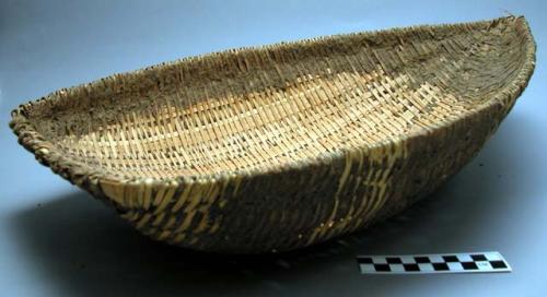 Wickerwork scoop-shaped basket