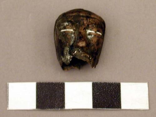 Metal, head of human figurine