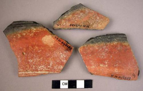 3 potsherds - shiny black and red outside, shiny black inside