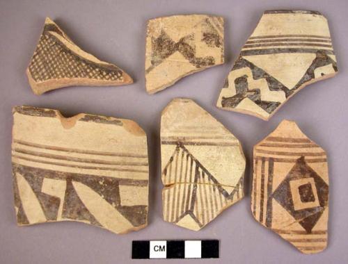 19 Quetta ware potsherds (3 restored)