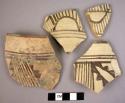 4 Quetta ware potsherds (1 restored)