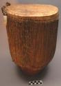 Wooden drum with pieces of eland hide on ends, kirembi