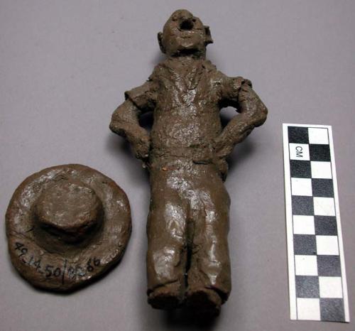 Pottery  human figure with detachable pottery hat. Muntu Made by boy under