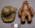 Small pottery human figure with detachable pottery hat.  Muntu Made by boy under