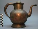 Simple tea pot of yellow brass with central band of red copper