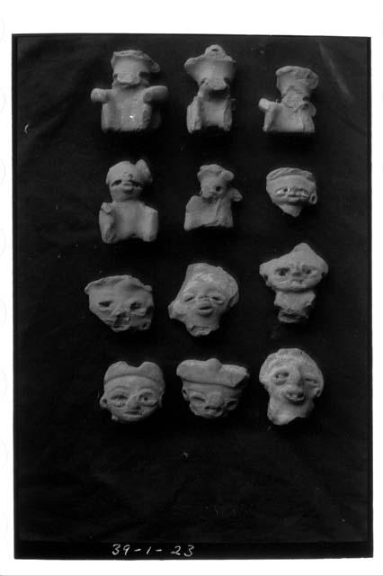 5 human figurines (same as 39-1-21) 7 human heads - Eastern Salvador