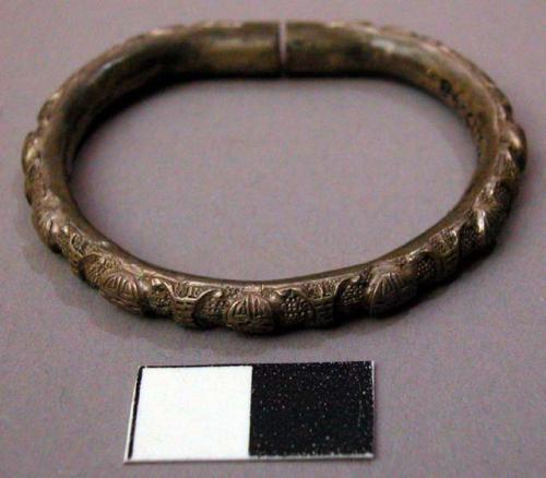 Pair of Silver Arm Rings Decorated with Designs in Relief