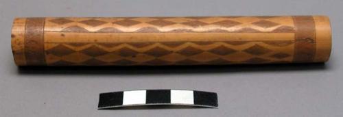 Incised section of bamboo