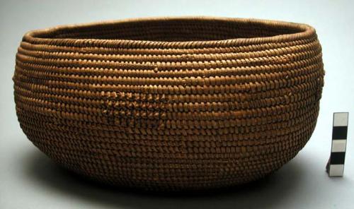 Elongated coiled basket