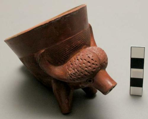 Red clay pipe bowls, decorated with animal figures - 4 antelope(?) 1 water buffa