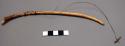 Musical bow, wood, with string, 8 in.  fxai n!au