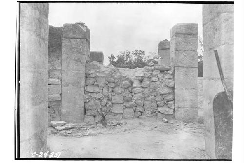 NE col. - E section of 2ndary wall beg. at sculpt. cols. SW of throne, looking N