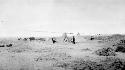 People at camp site in desert