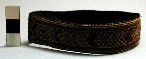 Fibre armband ("shemgwe") - red and yellow on black