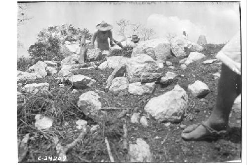 NE colonnade-closer view of sm. temple on top of high md W of NE Col looking S