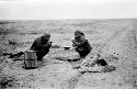 People eating in desert