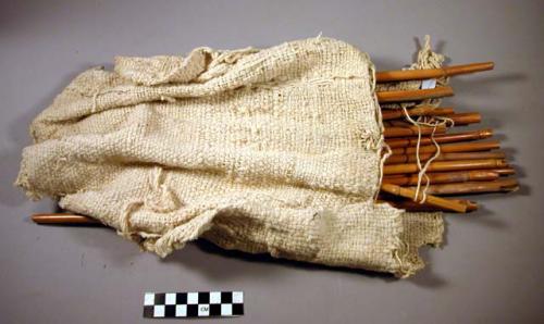 Woven bag with canes