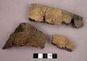 Ceramic rim and body sherds, stamped, mended