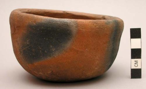 Small pottery bowl - red ware, coarse undecorated