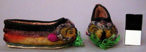 Fourteen Pairs of Doll's Shoes, Multi-Colored with Black Trim