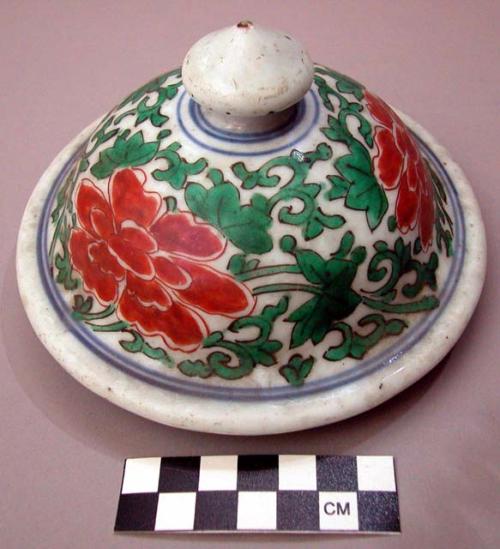 White Porcelain Jar Lid with Orange Floral Decoration and Blue Rings