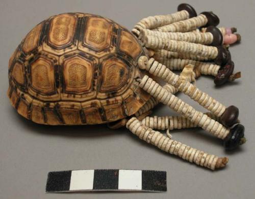 Tortoise shell compacts, each decorated with plastiv beads or beads from ostrich