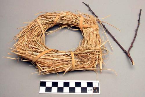 Ring of grass - used by women for carrying pots on head