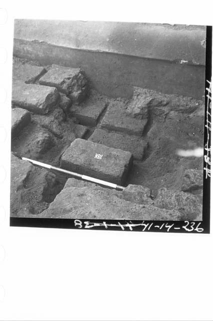 Adobe blocks packing front of terrace 6.  Phase I adobes.  Md. 1-NW.