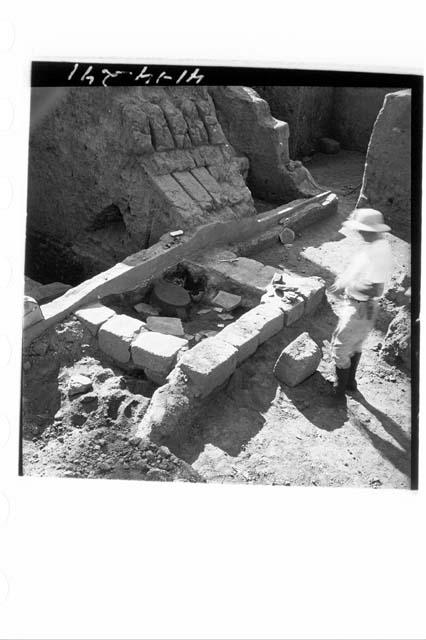 Altar A after removal of squared floor stones, showing slabs, overturned stone i