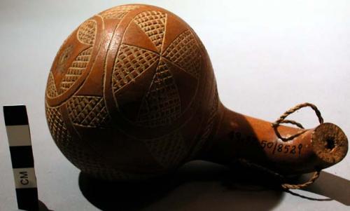Gourd rattle with engraved designs