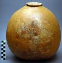 "Buge": goda bugo, gourd used for preparing batter used in making the staple bre