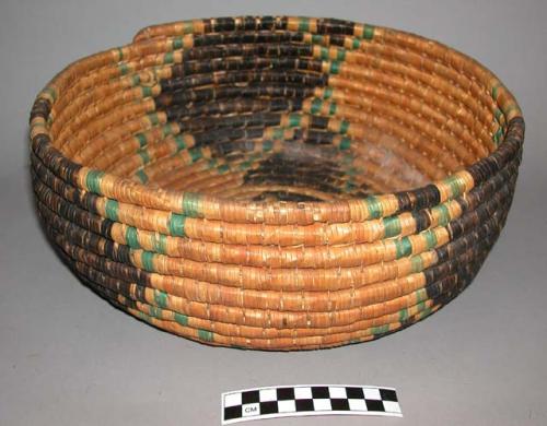 Colorful coiled built basket