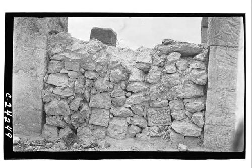 NE Colonnade - E. section of secondary wall beginning at sculptured columns SW o