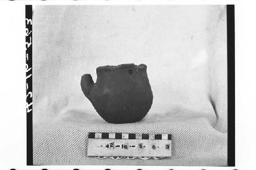 Spouted pottery cup