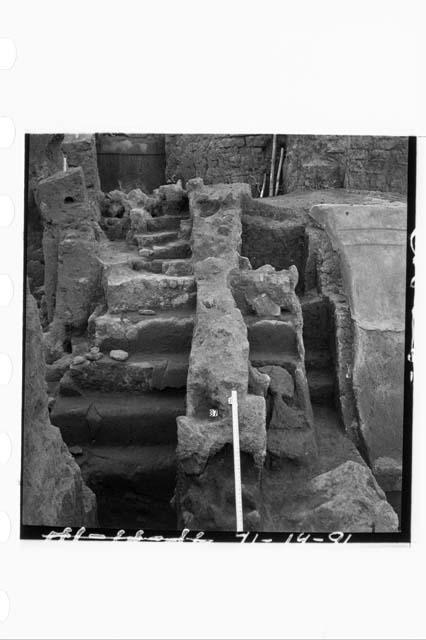 Ph. I adobe debris covering part of Ph. I concrete steps in sects. N68.9-10W.  F